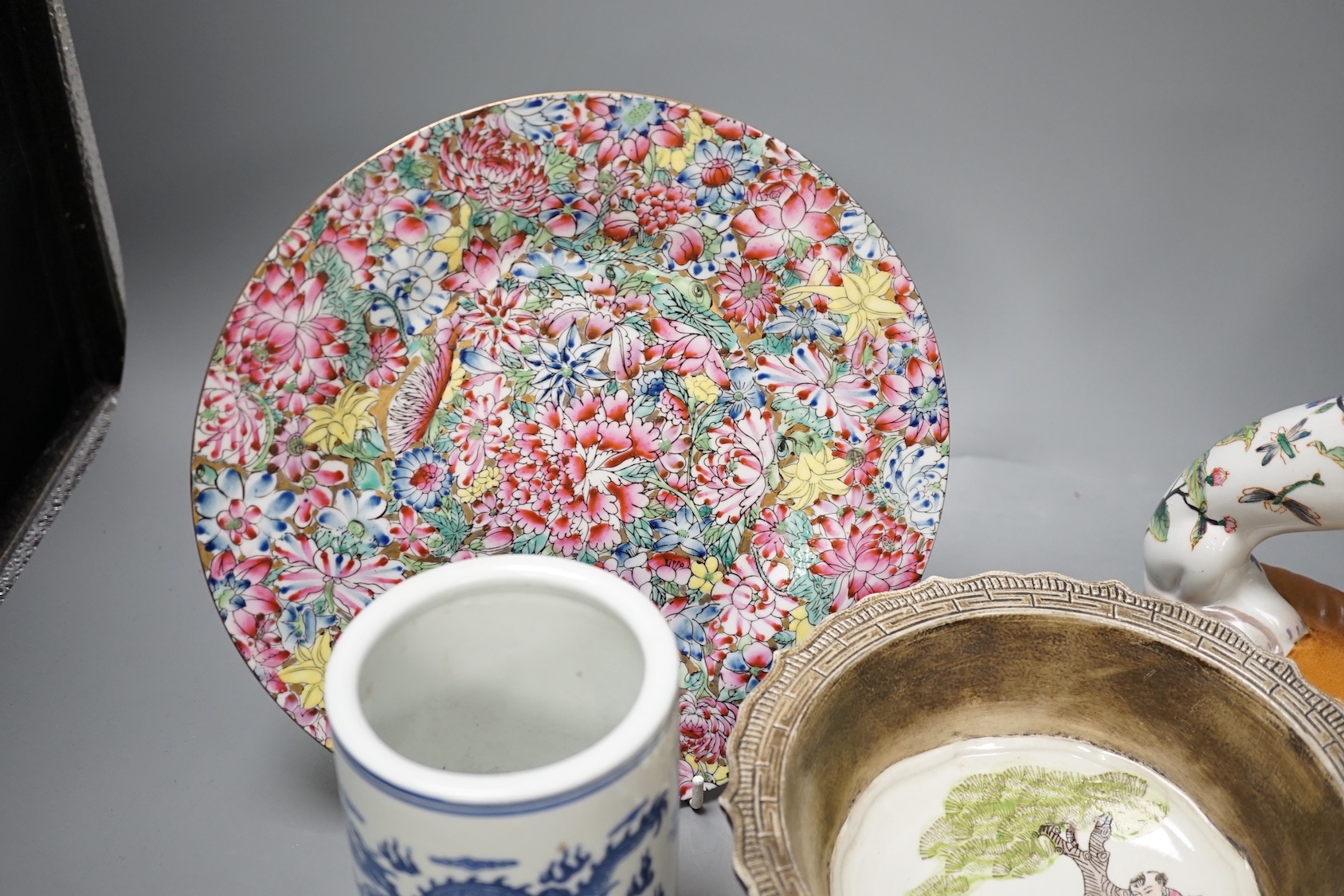 A Chinese porcelain bowl, brush pot, plate and a pair of dogs